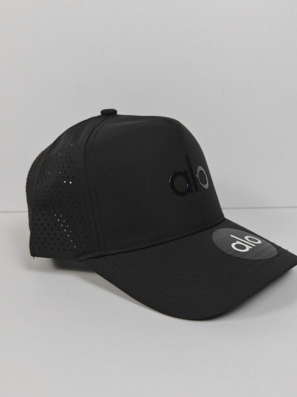 Alo Black Performance Trucker Hat